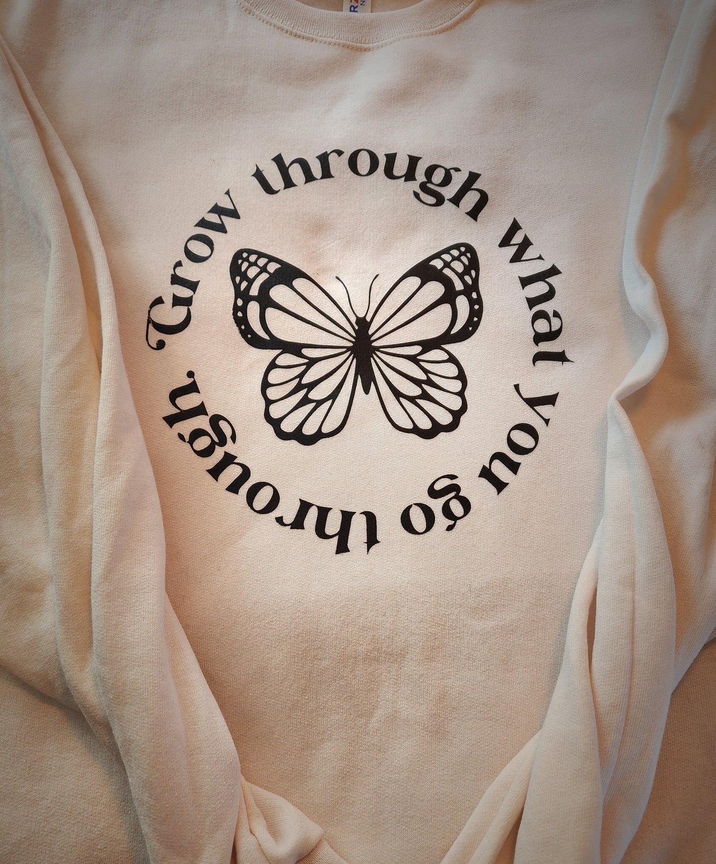 Grown through what you go through crewneck